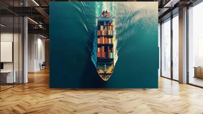 Large cargo ship navigating through open waters while transporting colorful shipping containers in daylight Wall mural