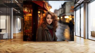 Young beautiful woman portrait, tourist in casual clothes is sightseeing on the street of european city in autumn, travel and tourism concept Wall mural