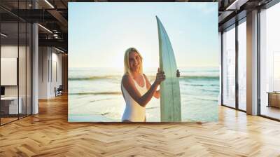 Portrait, beach and woman with vacation, surfboard and adventure with hobby, ocean and nature. Activity, surfer and person with journey, seaside and summer holiday with recreation, vacation and waves Wall mural