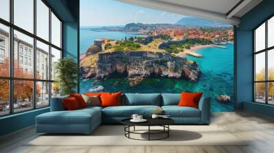 Majestic Aerial View of Ancient Coastal Fortress and Town in 8K UHD Resolution under Clear Blue Sky Wall mural