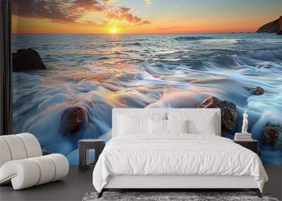 Serene Sunset Over Gentle Ocean Waves and Rocks Wall mural