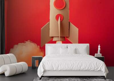 cardboard rocket launch, isolated on a red backgrund. kids. high quality photo Wall mural