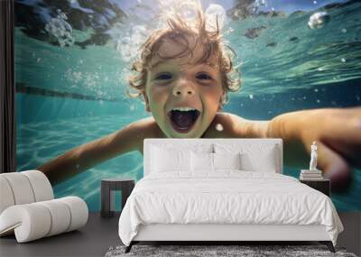 Happy kid swimming underwater and having fun. Happy childhood and summer vacation. High quality photo Wall mural