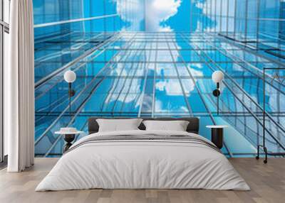 Reflective skyscrapers, business office buildings. Low angle photography of glass curtain wall details of high-rise buildings.The window glass reflects the blue sky and white clouds. . High quality Wall mural