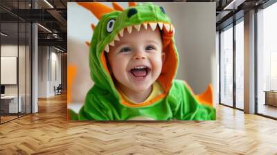 A baby in a green dragon costume smiling and laughing, AI Wall mural