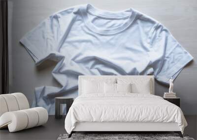 A crumpled white t-shirt laying on a wooden table with no other objects, AI Wall mural