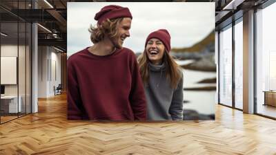 A man and woman in red sweaters and beanies. AI Wall mural