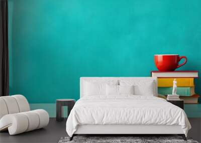 A stack of books and a cup on top with turquoise wall behind, AI Wall mural