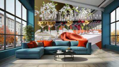 A table with many glasses of wine and flowers on it, AI Wall mural