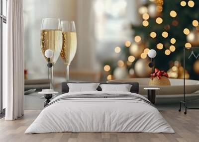 A table with two glasses of champagne and a christmas tree, AI Wall mural