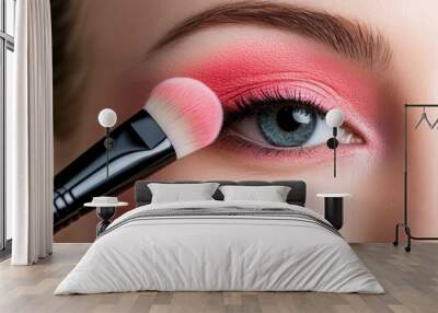 A woman with bright pink eye makeup and a brush in her hand, AI Wall mural