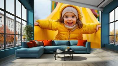 A young girl in a yellow jacket sliding down the slide, AI Wall mural