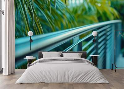 Sleek metal railing with lush green palm leaves in the background, AI Wall mural