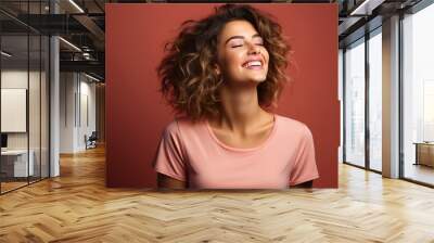 laughing girl on a pink background Wall mural