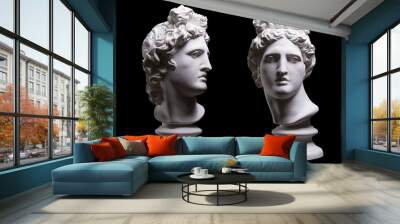 Statue. On a black isolated background. Gypsum statue of Apollo's head. Man.Statue. On a black isolated background. Gypsum statue of Apollo's head. Man. Wall mural