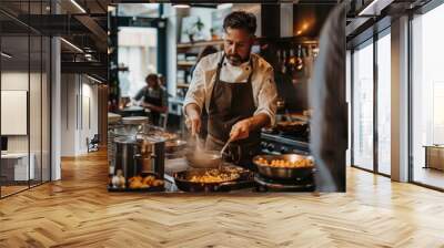 A chef is cooking in a kitchen with a lot of food on the counter Wall mural