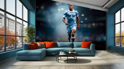 a soccer player in a blue sports uniform is kicking the ball with dark blue background with blue smoke Wall mural