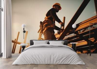 Asian builder in uniform and helmet stands under metal frames on unfinished bridge Wall mural