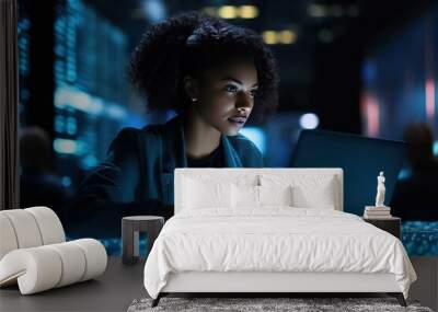 A young African American woman with a laptop in a server room. Collection and storage of large amounts of data. Checks the operation of servers and automation. Wall mural