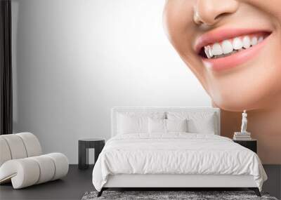 Closse up view of a female smile. Dental concept Wall mural