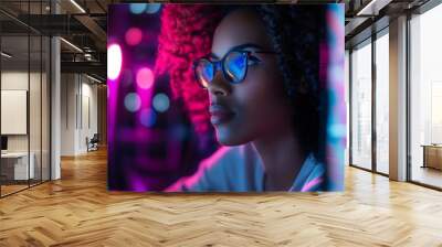 Concentrated female IT specialist, African American businesswoman confident female manager, attractive black woman with glasses and curly hair working on computer, watching digital screen,  Wall mural