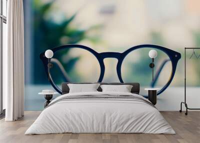 Eyeglasses and eyewear accessory with modern frame and optics, isolated against background for vision and style, featuring classic and retro lens design, optical element eyesight Wall mural