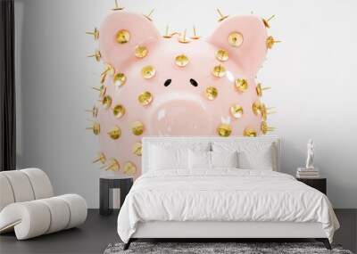 Concept image illustrating protecting savings and investments showing a pink piggy bank protected by drawing tacks and isolated against a white background. Wall mural