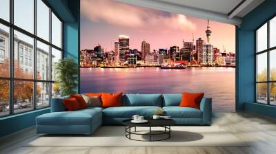 Panoramic view of Auckland city skyline and harbour at sunset as seen from the North Shore. Auckland, known as the 