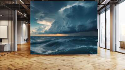 fluffy clouds drifting in a dark sky with distant thunderclouds Wall mural