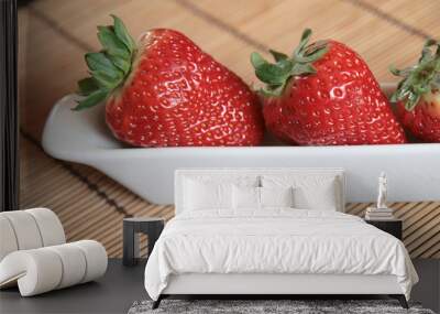 Cloese-up of strawberries in a white porcelain pot Wall mural