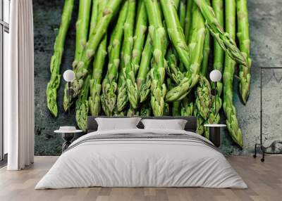 Bunch of green asparagus, top view Wall mural