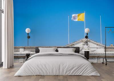 Loreto, the flag of the Vatican city flies over the buildings of the sanctuary Wall mural