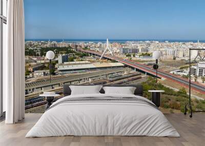 Aerial view of the Adriatic bridge in Bari, Puglia, Italy. It is a cable-stayed bridge that connects the city by passing over the railway. In the background is the Mediterranean Sea. Wall mural