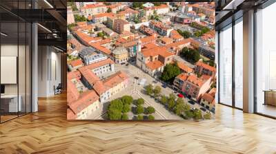 Aerial view of the parish church of San Remigio in Vimodrone, in the metropolitan city and archdiocese of Milan, Italy. This Catholic place of worship is part of the deanery of Cologno Monzese. Wall mural