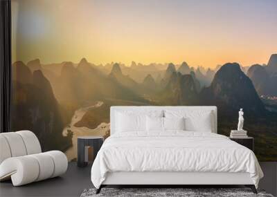 Sunlight over the beautiful karst landscape of Xingping, Guilin, China Wall mural