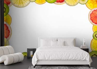 mixed sliced fruits isolated on white background back lighted as Wall mural