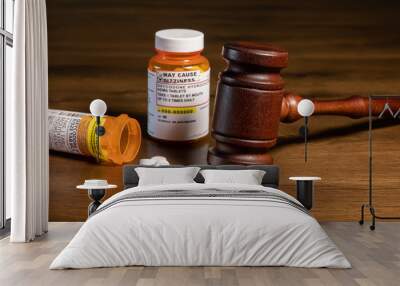 Oxycodone is the generic name for opoid pain killing tablets. Prescription bottle for pills and tablets with judge's gavel for court decision Wall mural