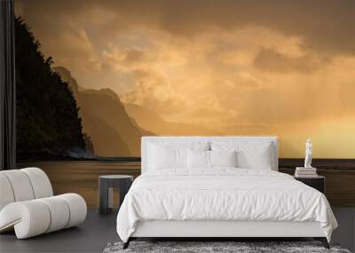 Sunset lights the receding cliffs of the NaPali coastline on north coast of Kauai in Hawaii Wall mural