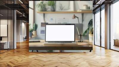 A laptop is on a desk in front of a window with a view of mountains Wall mural