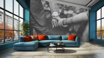 Indian couple's holding hands close up Wall mural