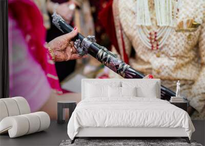 Indian Punjabi groom's wedding sword close up Wall mural