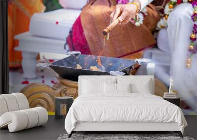 South Indian Tamil couple's wedding ceremony ritual items and hands close up Wall mural