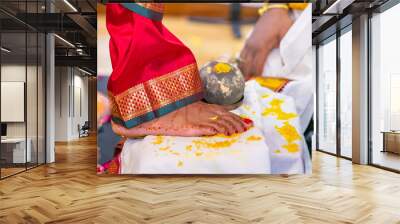 Tamil Hindu wedding ceremony rituals, bride's feet and rings close up Wall mural