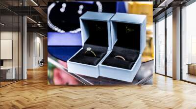 Wedding rings in black velvet boxes close up Wall mural