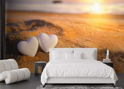 two hearts in sand on the beach at sunset valentine day love background Wall mural