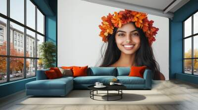 Portrait of beautiful Indian smiling woman with wreath of autumn leafs. Healthy clean fresh skin natural make up beauty eyes on white background Wall mural