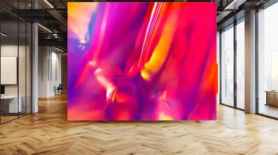 Abstract digital intense night club background of multicolored vibrant festive smooth orange and magenta colors with blurred fluid lights Wall mural