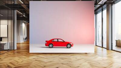 Concept new car. Red toy car flying Wall mural