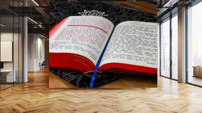 An open religious Orthodox book in the old church language lies in the church during the Orthodox liturgy. The concept of Orthodoxy. Wall mural