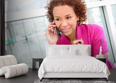 pretty business woman on phone Wall mural